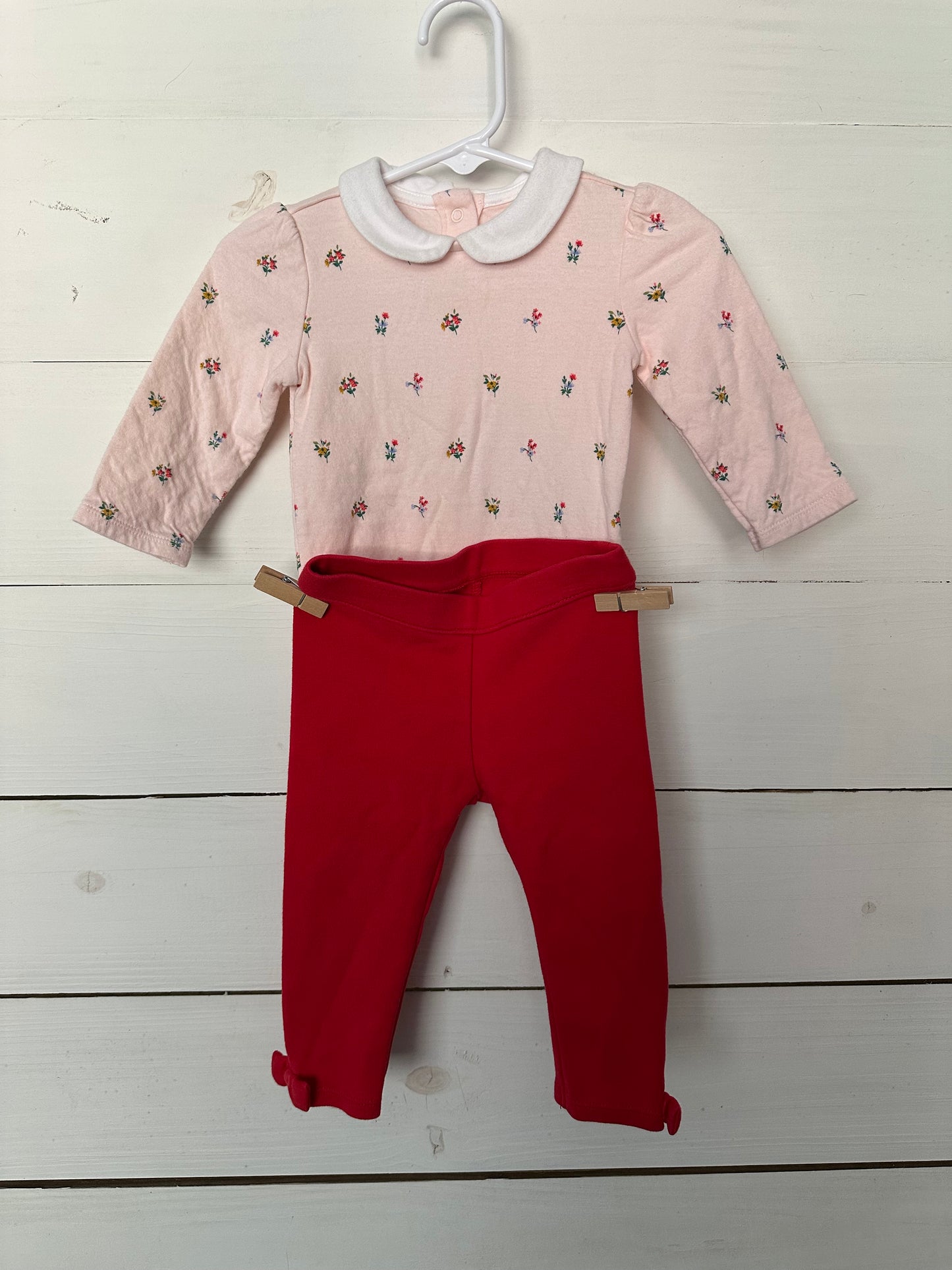 Janie & Jack pink collared onesie with flowers & red leggings with bows at the bottom