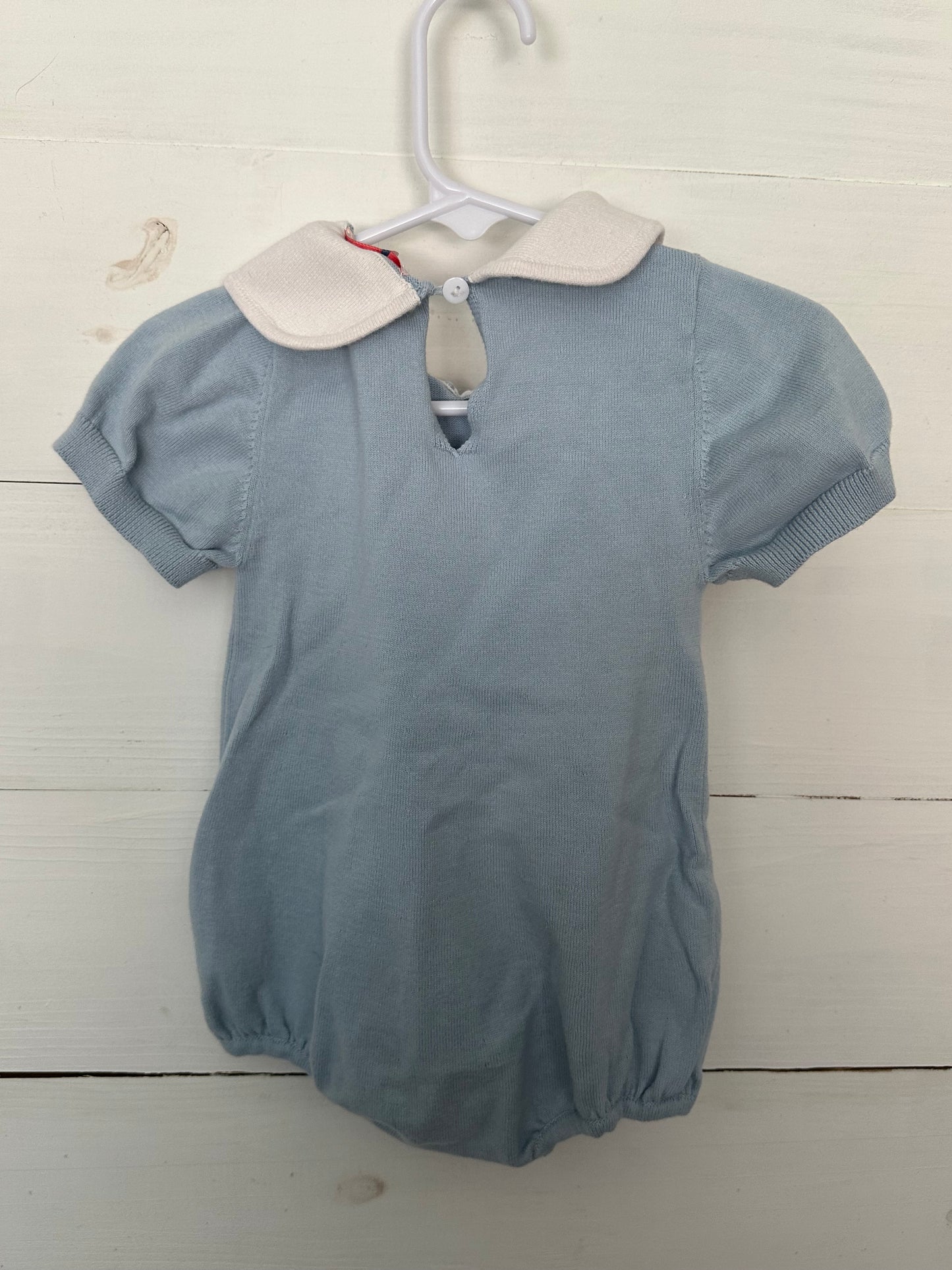 Smockingbird: Knit baby blue bubble with peter pan collar and henry embroidered