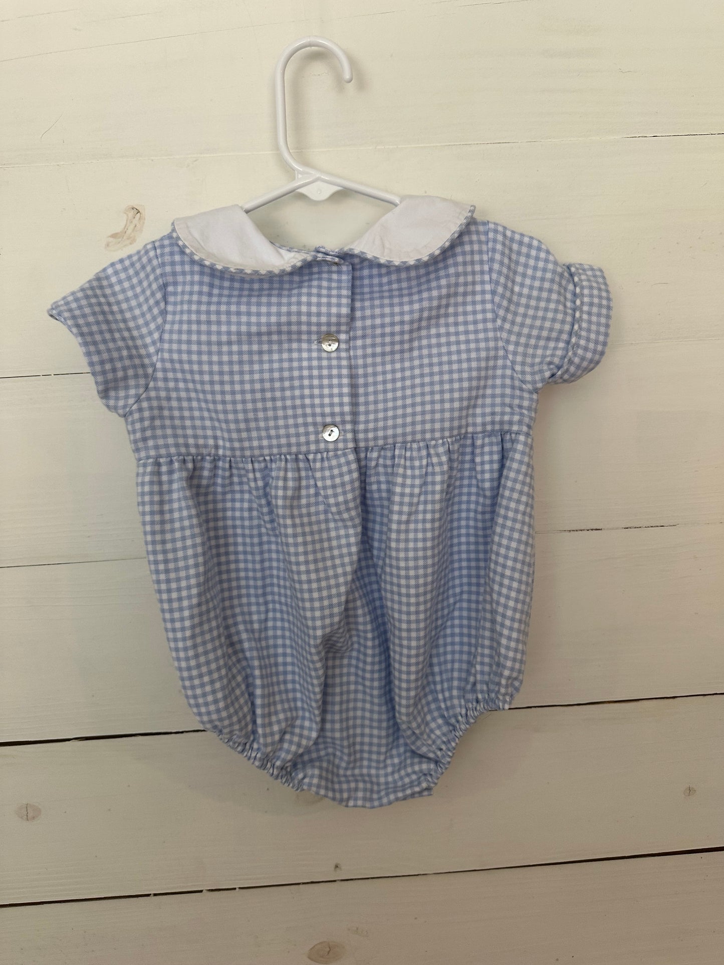 Shrimp & Grits Kids: Baby blue gingham bubble with pastel fall pumpkins, tractor, & wagons.