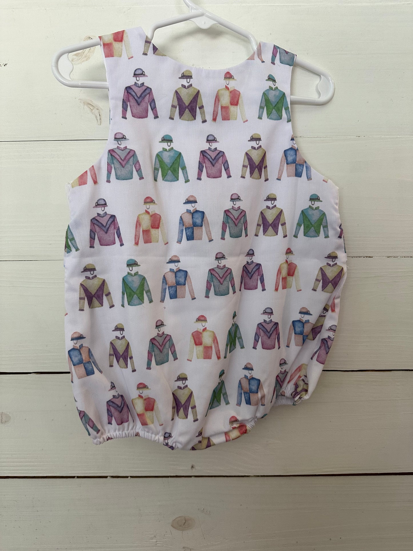 The Sage Smocking Company - Kentucky Derby Romper Smocked with horses and jockey