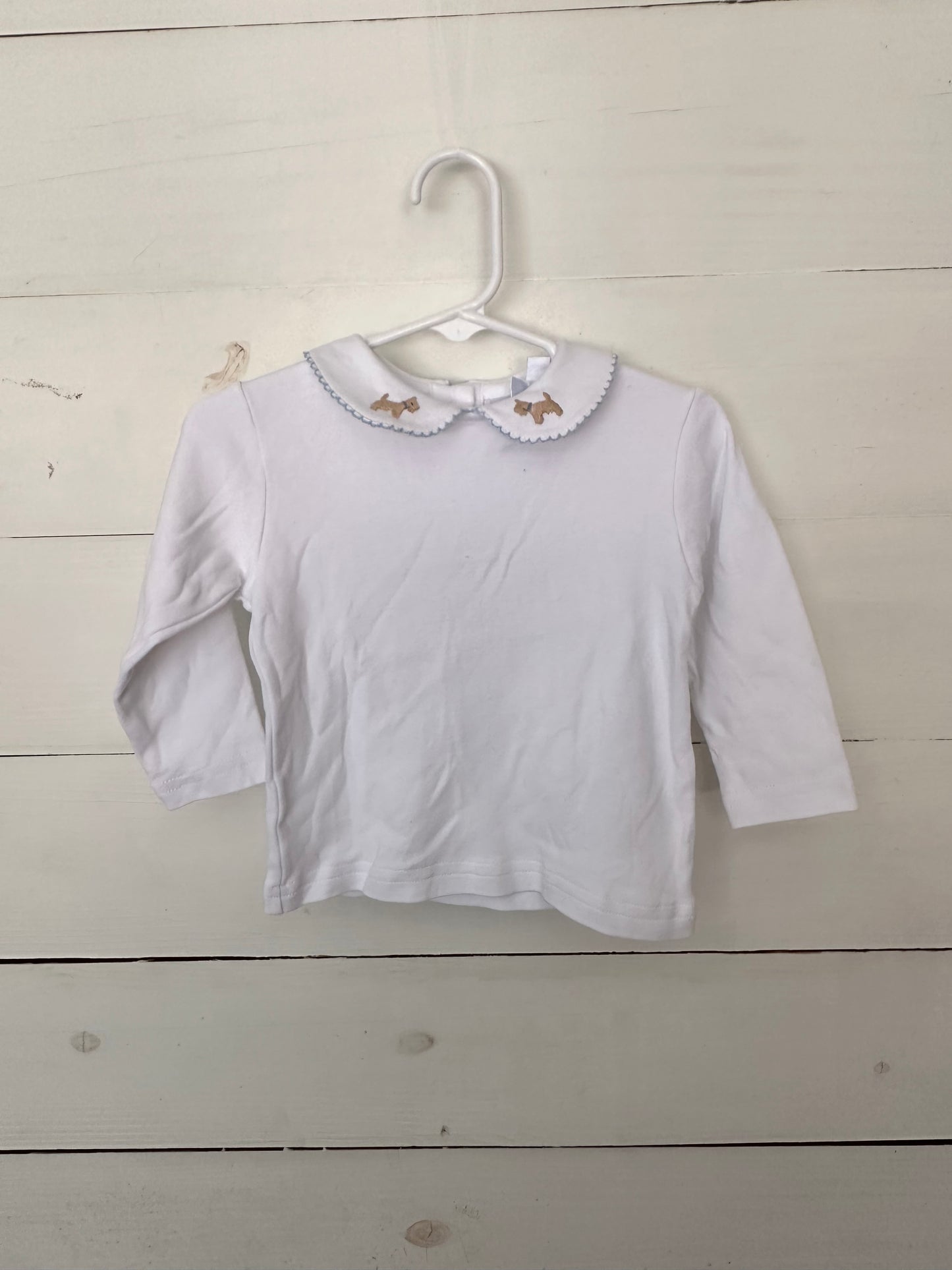 Little English: White peter pan collar shirt with blue stitching on collar and embroidered tan Scotties with blue collars