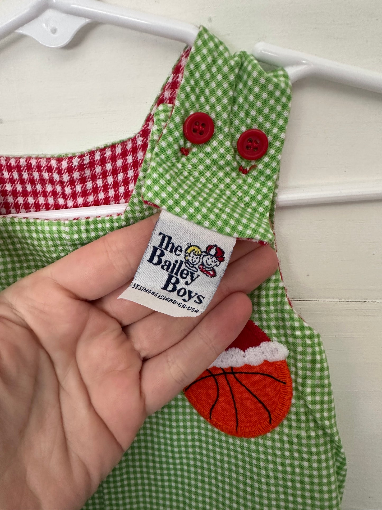 The Bailey Boys - Reversible Overalls Red Gingham with white dog - green gingham with sports balls with santa hats