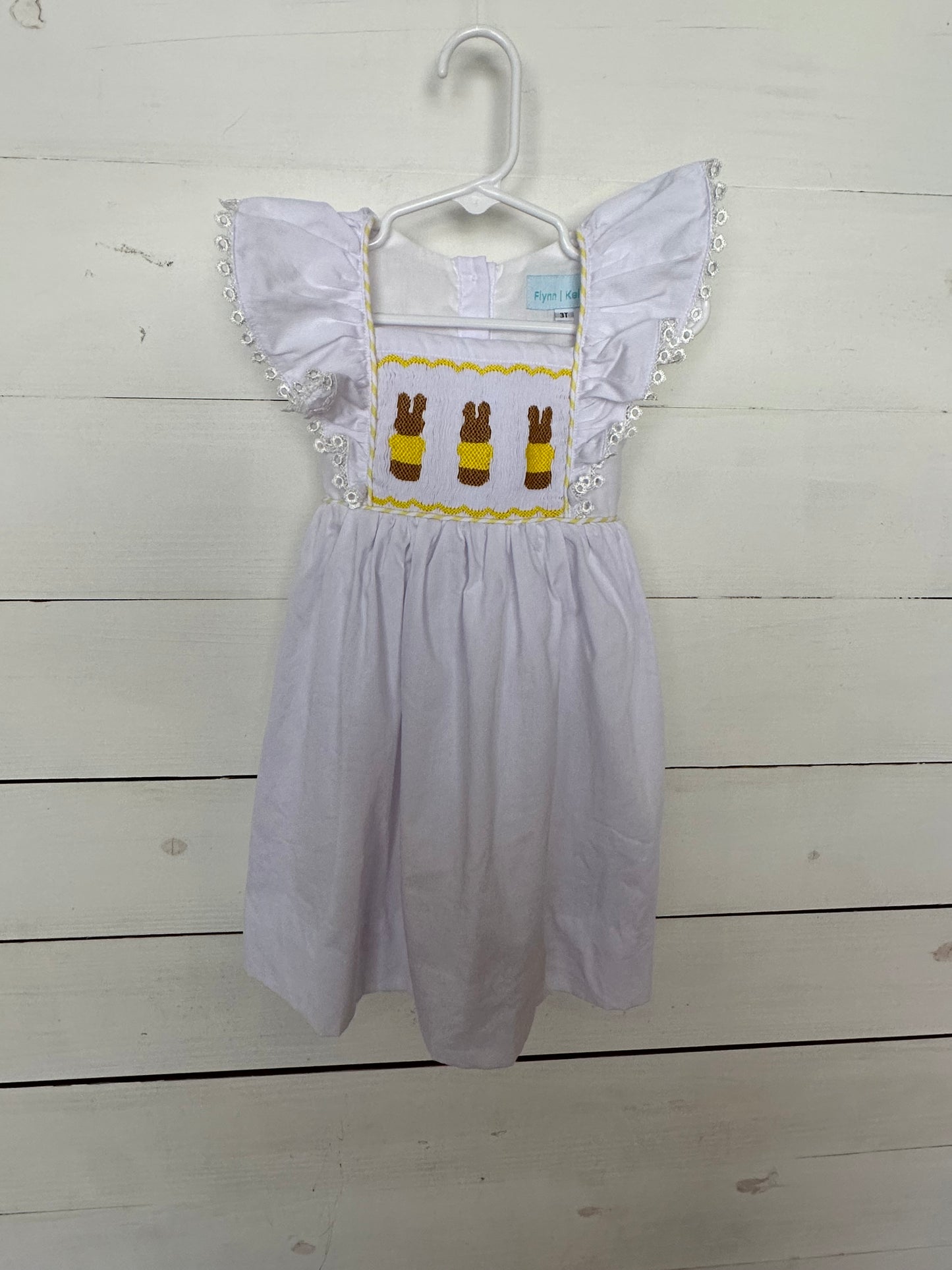 Flynn & Kelsey White Dress with Smocked Easter Bunnies & Flutter Sleeves