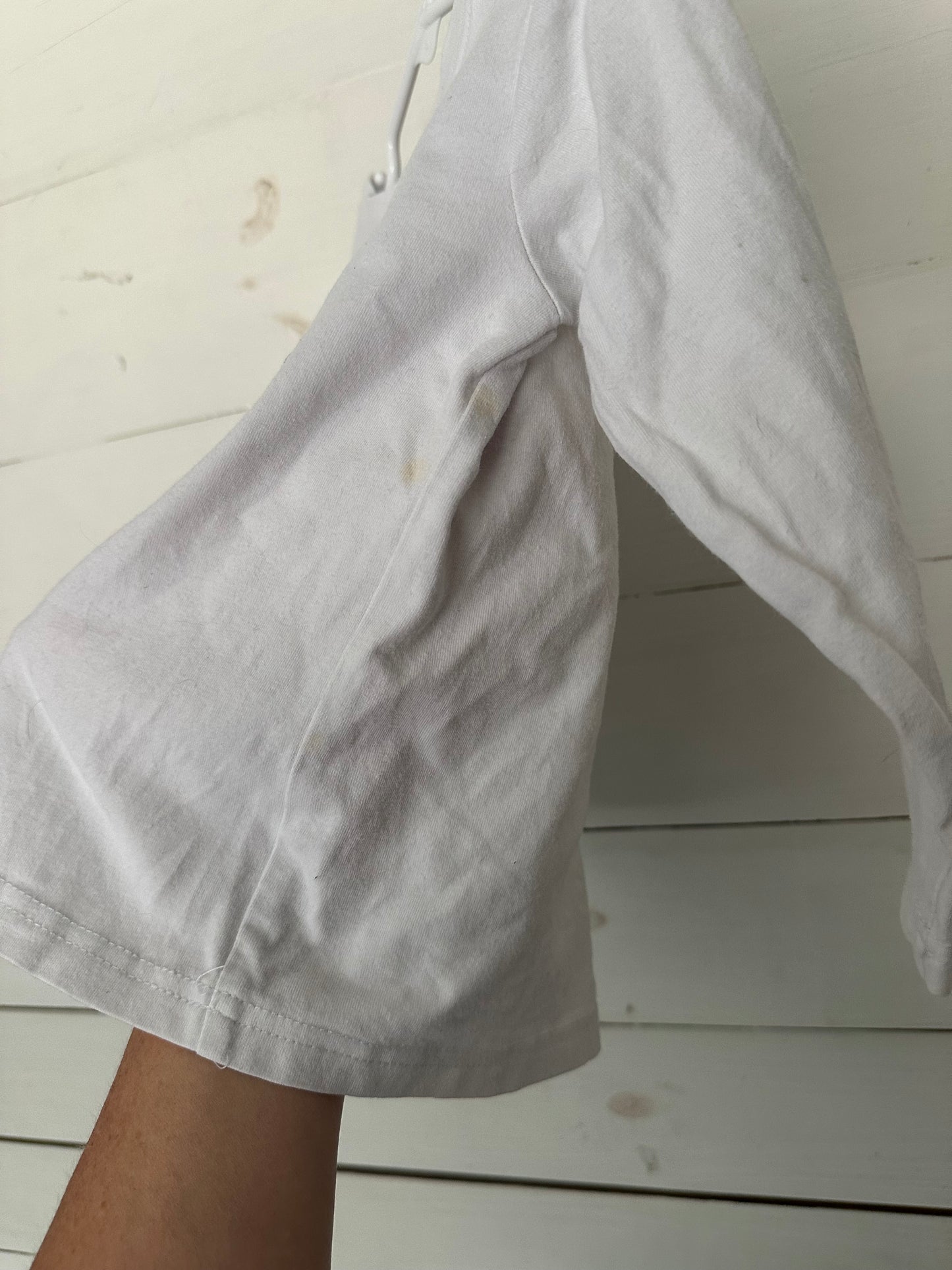 Long-sleeve white shirt with appliqued Santa