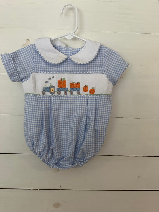 Shrimp & Grits Kids: Baby blue gingham bubble with pastel fall pumpkins, tractor, & wagons.