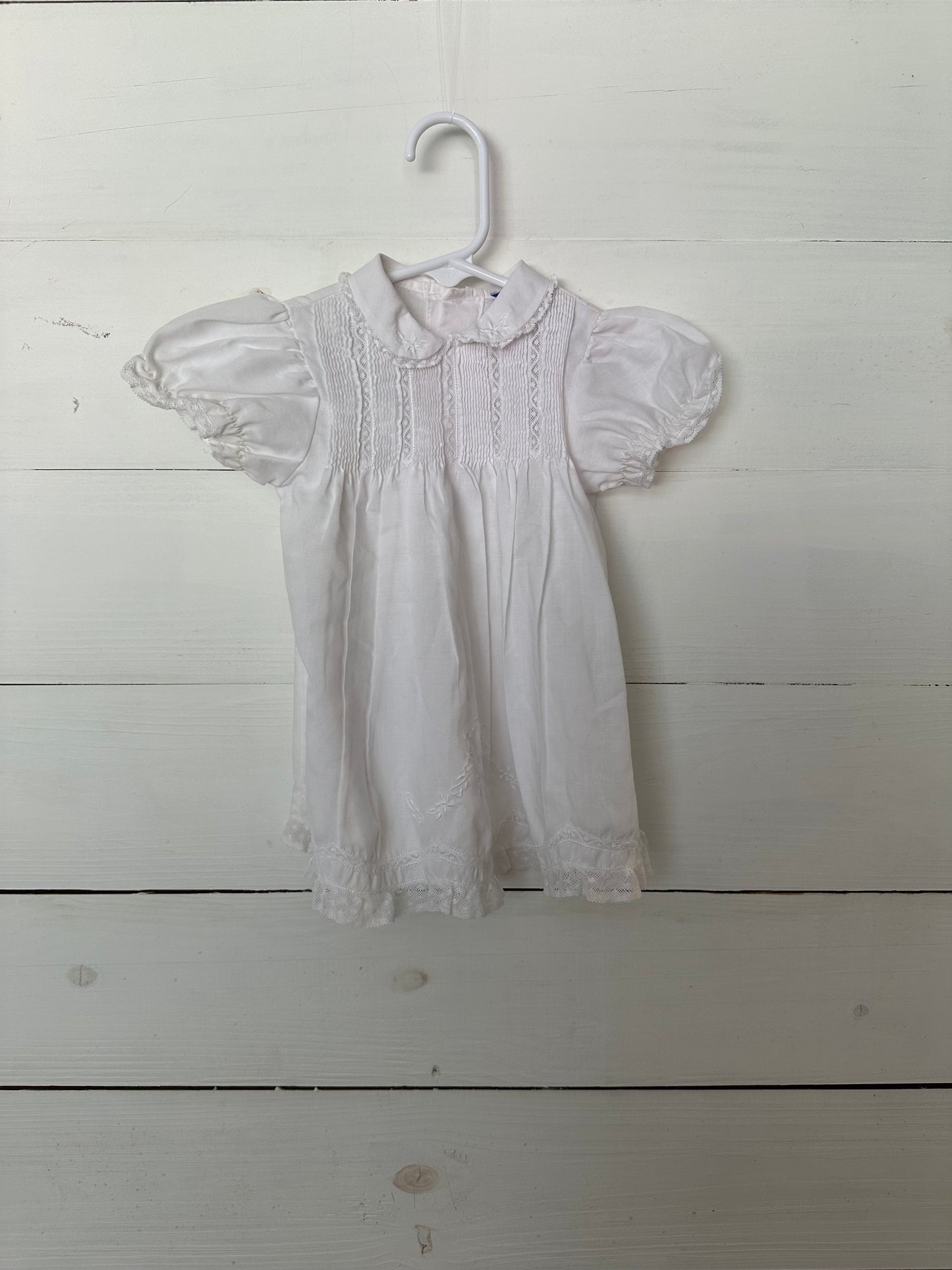 Carriage Boutiques White Smocked with lace detail and embroidered flowers dress
