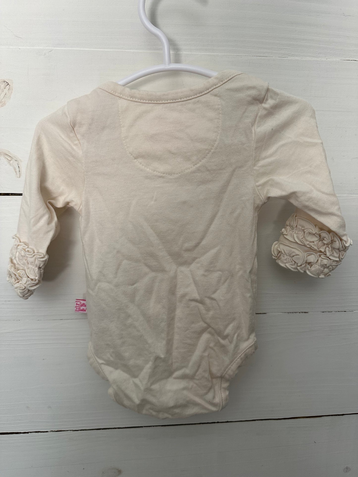 3-6M - Ruffle Butts Cream Onesie with Ruffles around Wrist