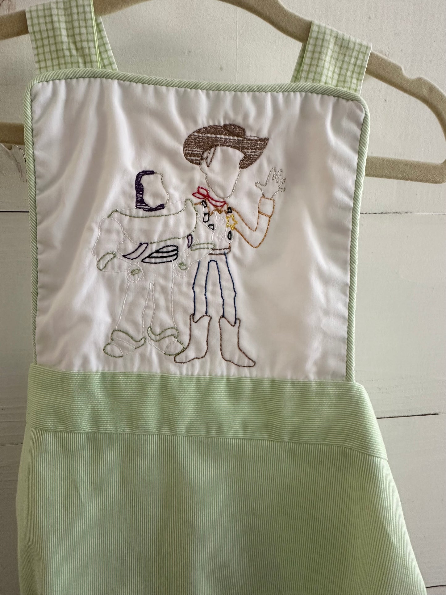 TBBC Sunsuit Featuring Woody & Buzz