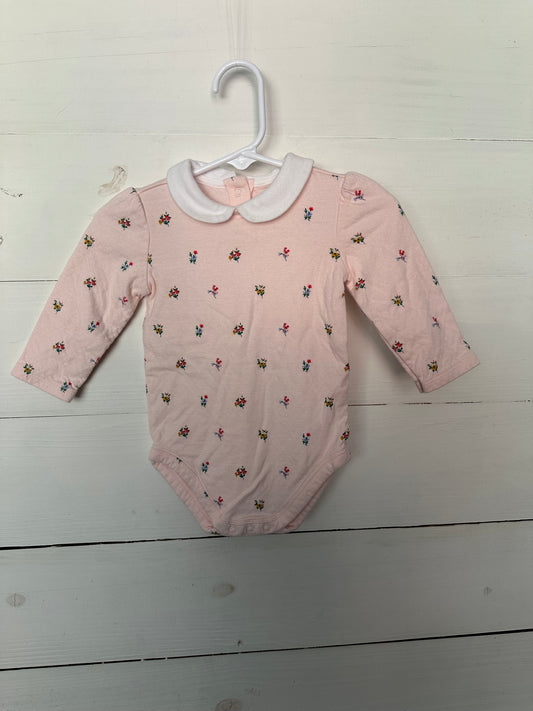 Janie & Jack pink collared onesie with flowers & red leggings with bows at the bottom