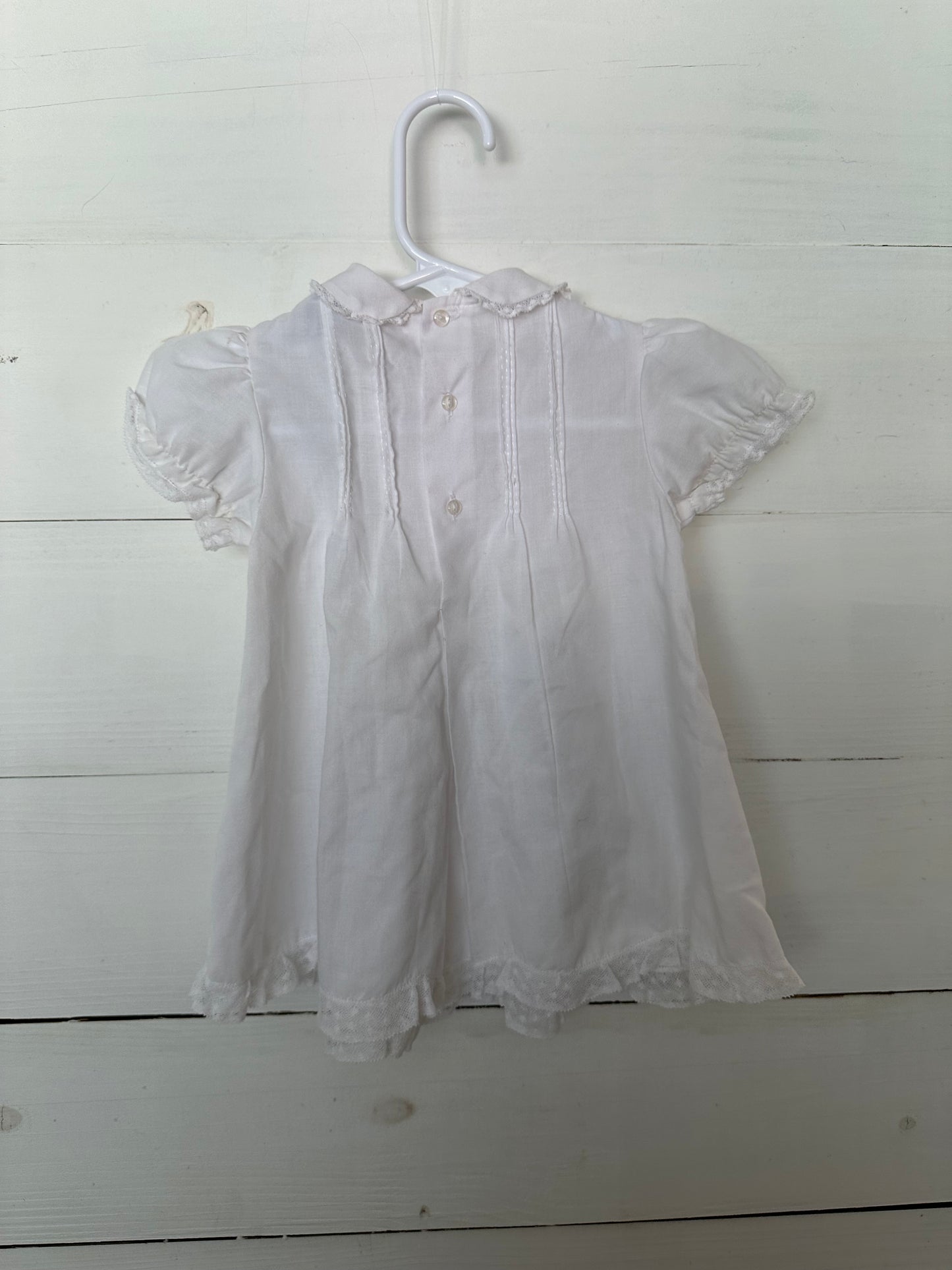 Carriage Boutiques White Smocked with lace detail and embroidered flowers dress