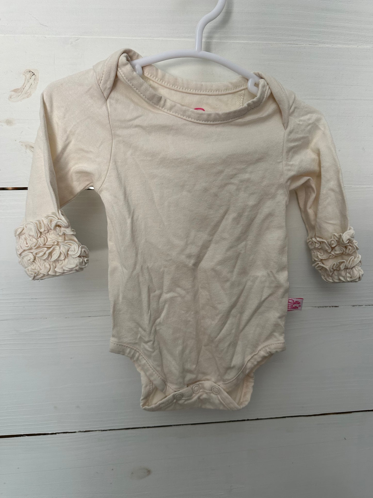 3-6M - Ruffle Butts Cream Onesie with Ruffles around Wrist