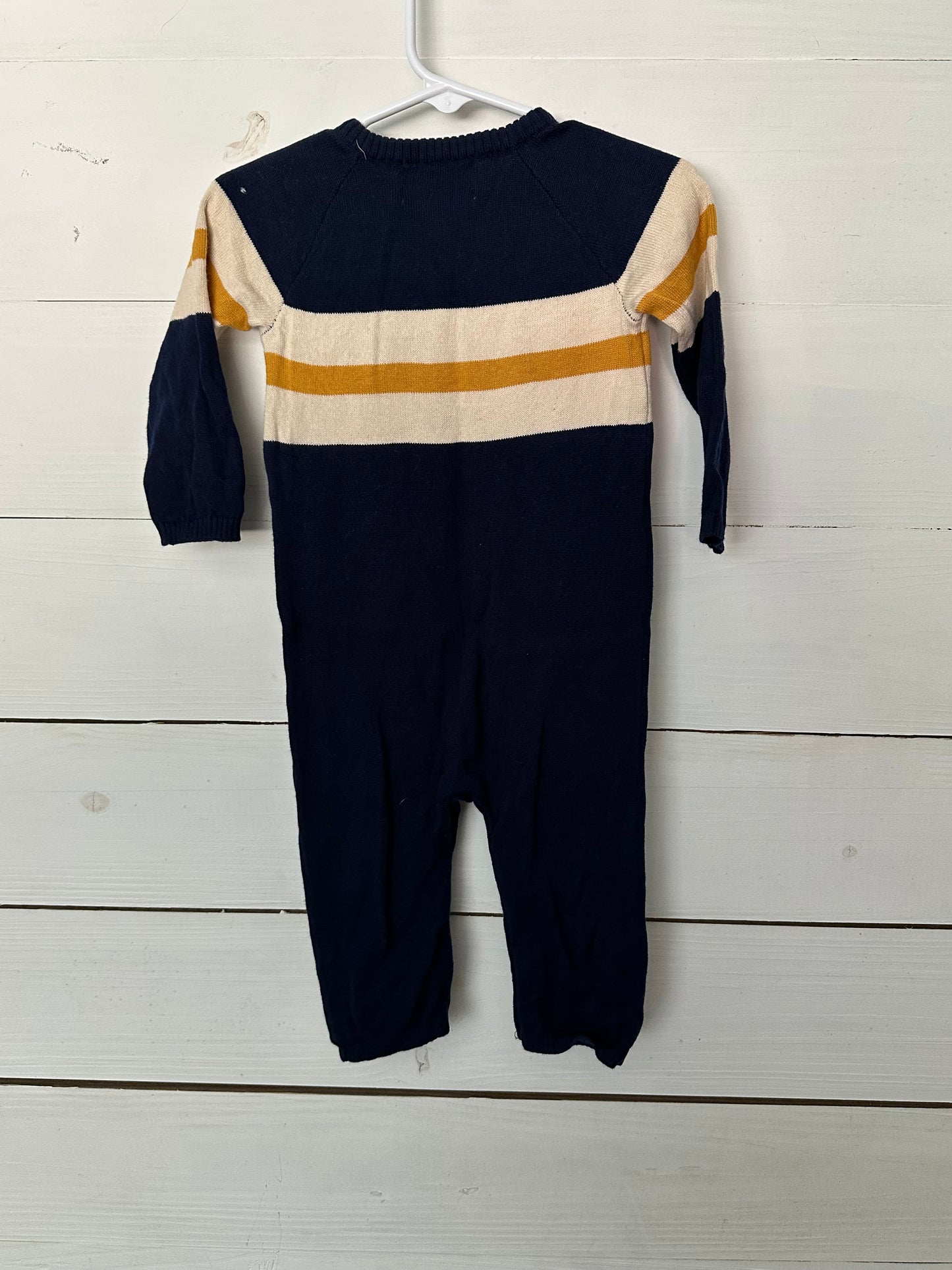 Good Lad knit navy football romper with gold and white accents